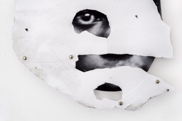 Frida Orupabo, Pikkasso's mask, 2021 (detail), collage with split pins mounted on aluminium, 40 x 30 cm,15 3/4 x 11 3/4 in (FO00169). Courtesy Galerie Nordenhake